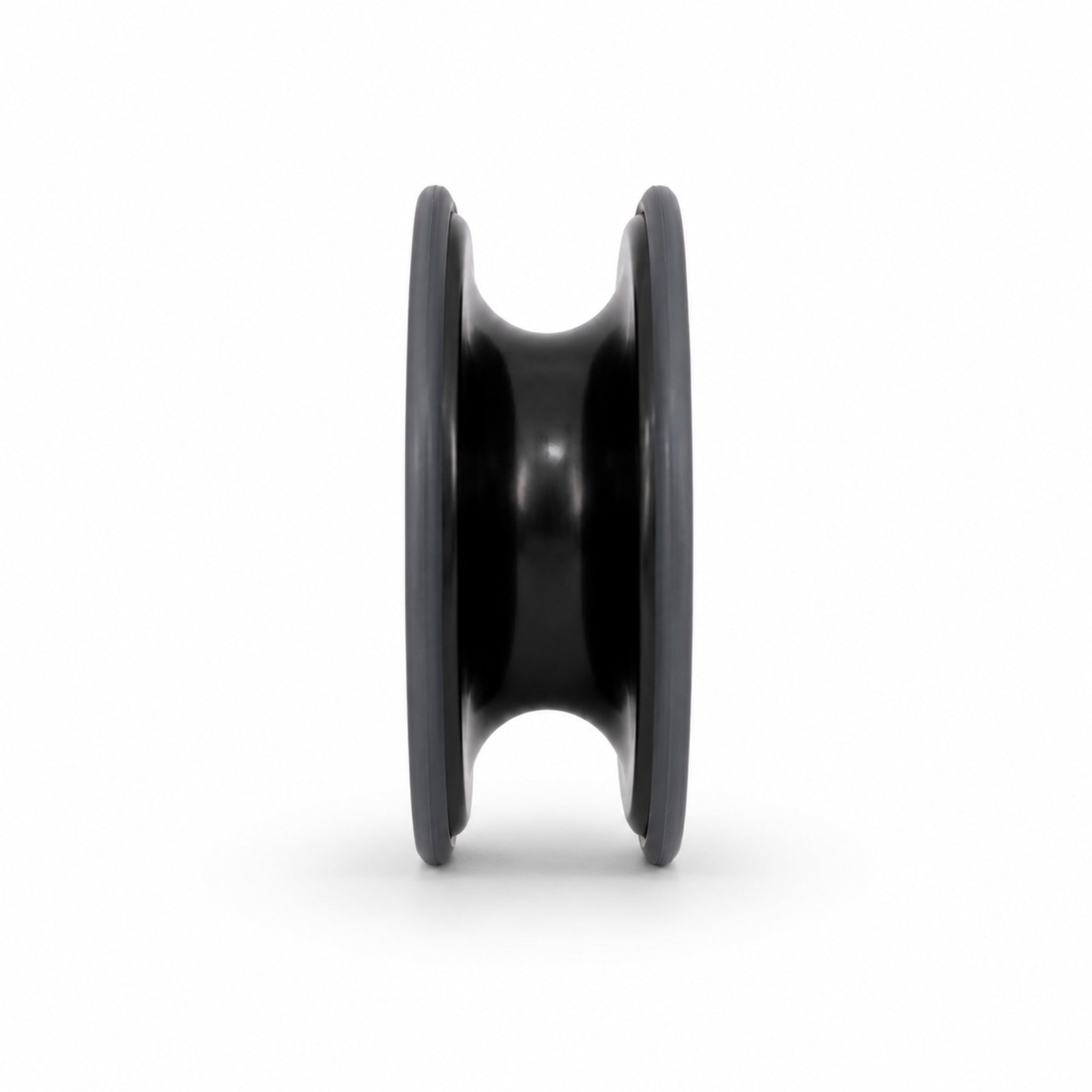 Side profile of the Olli low friction ring showing the rope groove geometry