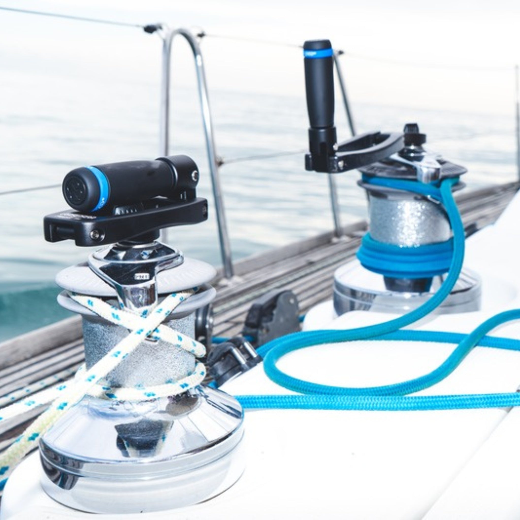 Easysea Flipper winch handles left ready on the winches of a sailing yacht cockpit
