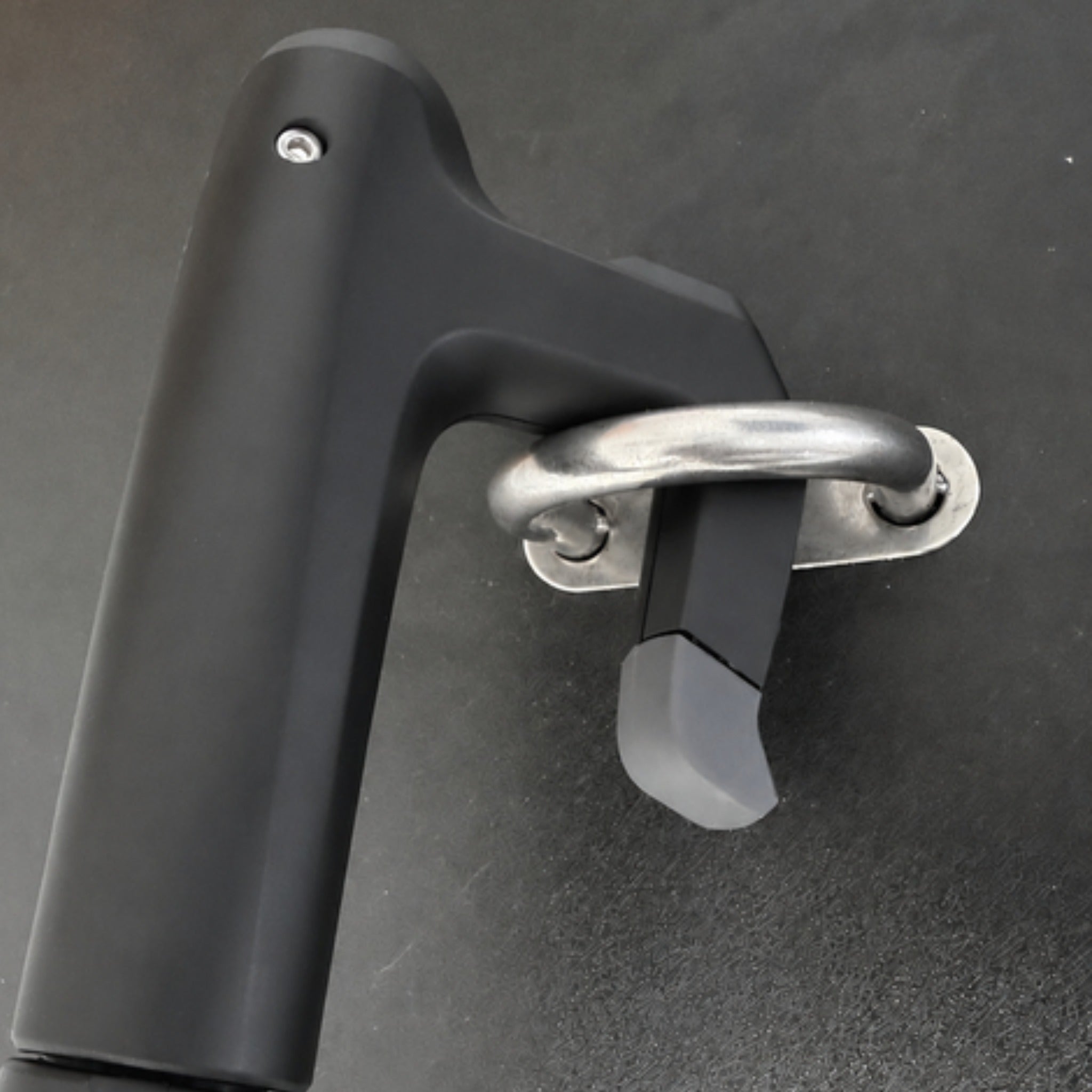 Jake boat hook head hooking a stainless steel deck handle
