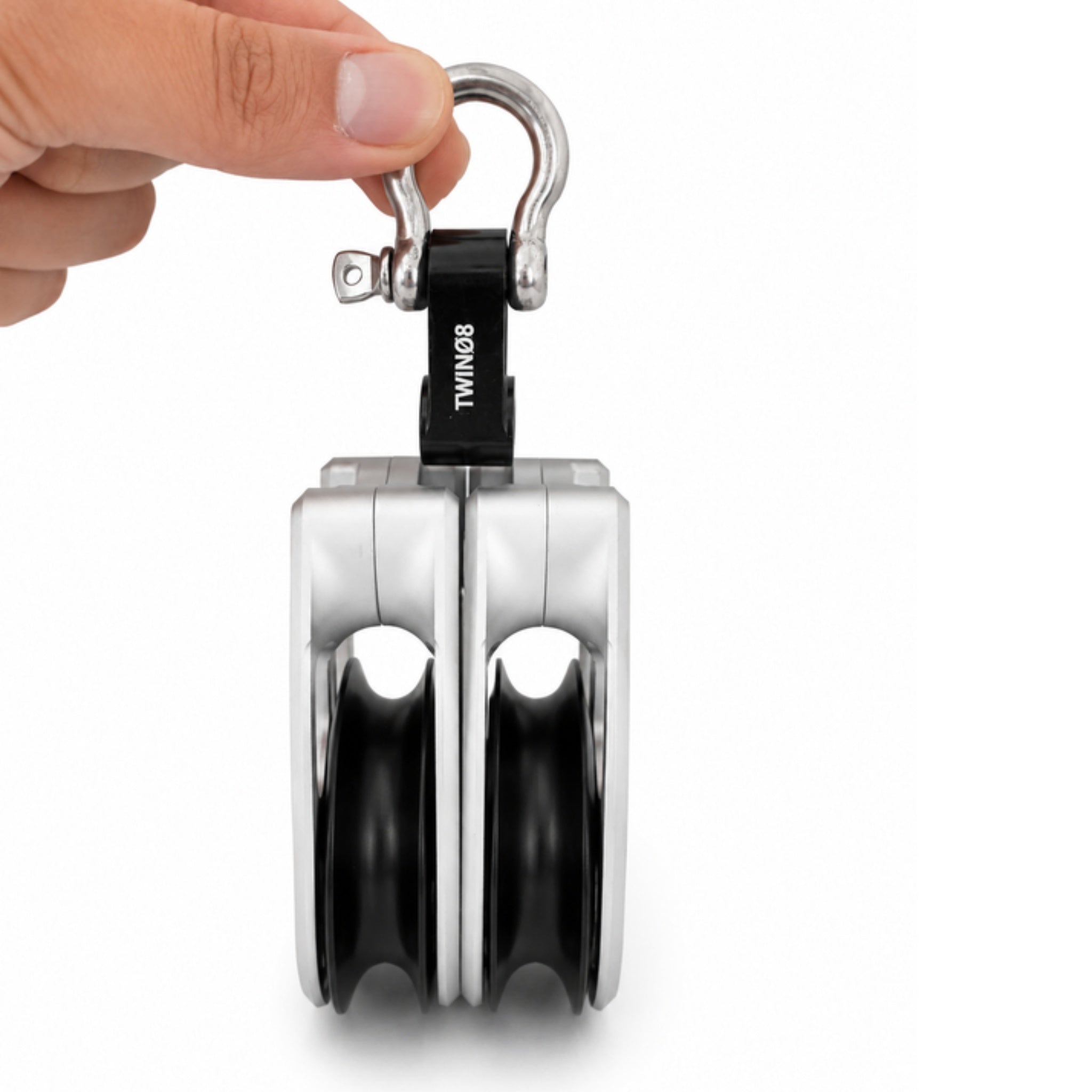 Olli Flex 50 M double block held by the twin stainless shackle head, showing how compact it is