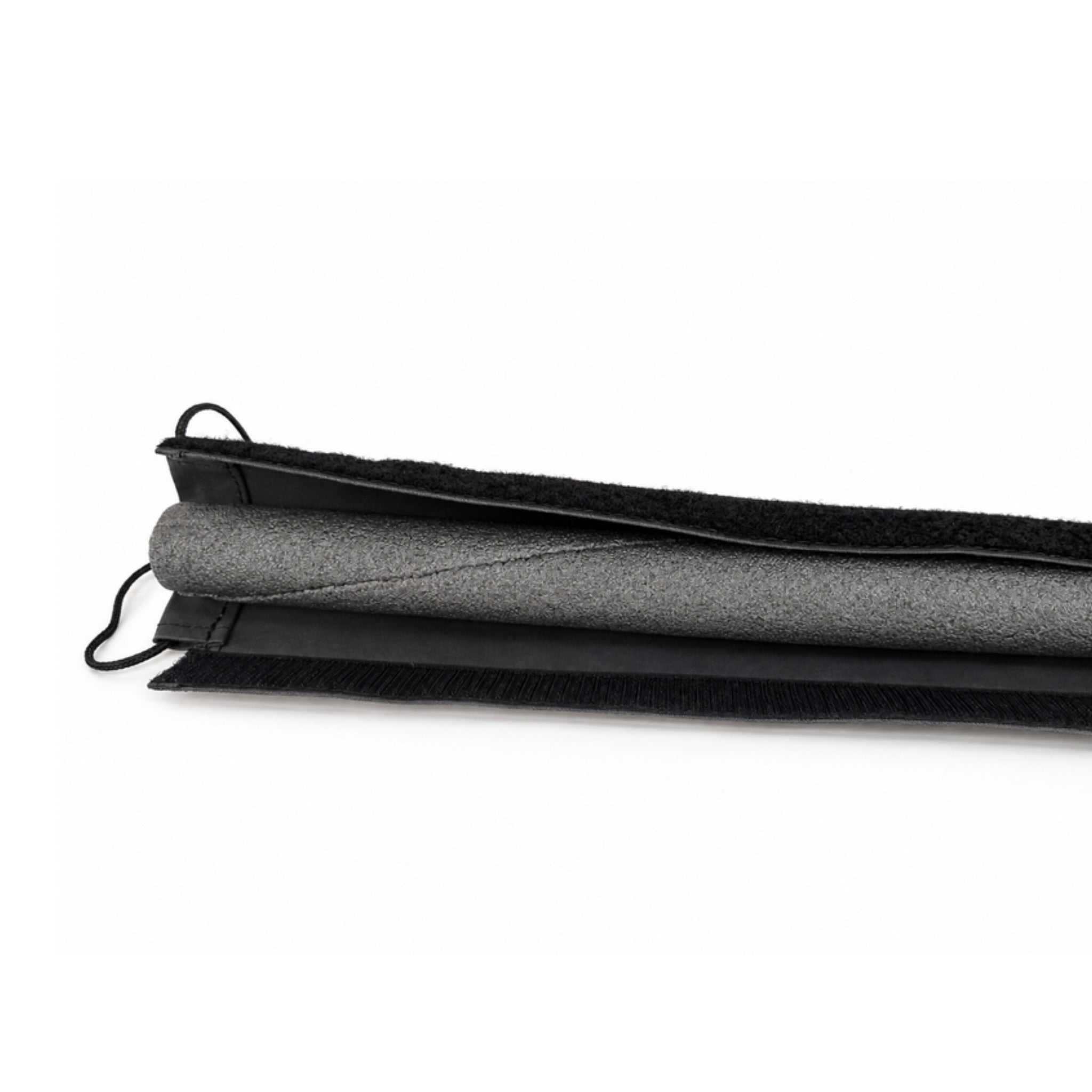 End of the Spira guardrail cover showing the foam core, the sleeve, the hook and loop strip and the shockcord loop